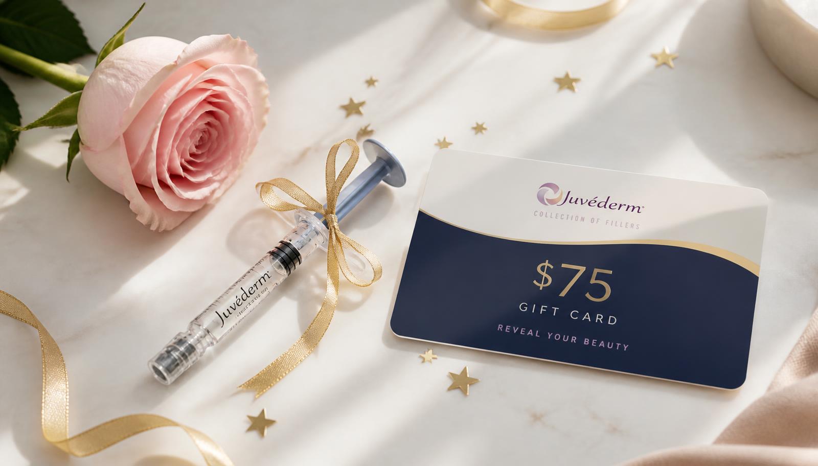 Elegant Juvéderm gift card and syringe flat lay with a pink rose and gold accents for Juvéderm Day 2026 at Remedy+ in Grand Rapids.