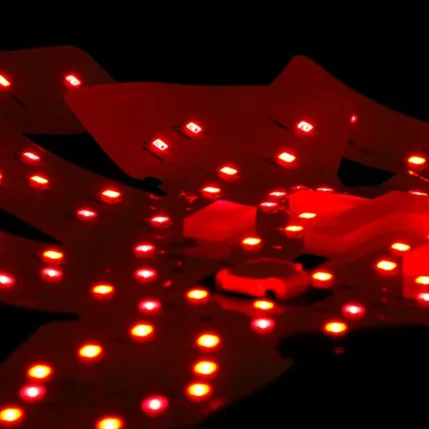 REVIAN Red LED array glowing with red and orange wavelengths
